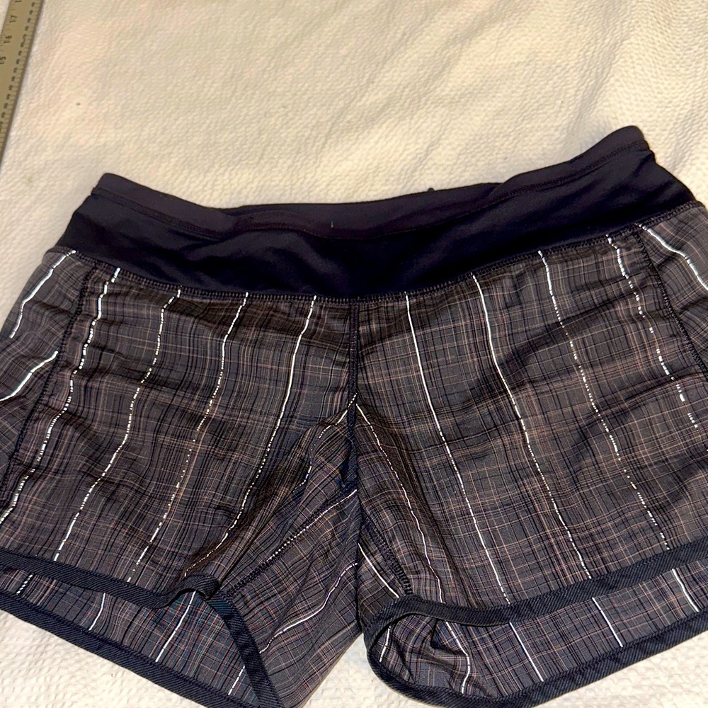Lululemon size 4 gray/ pink Plaid Shorts